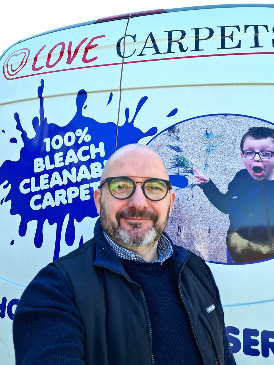 Craig outside the Love Carpets bleach cleanable carpets display