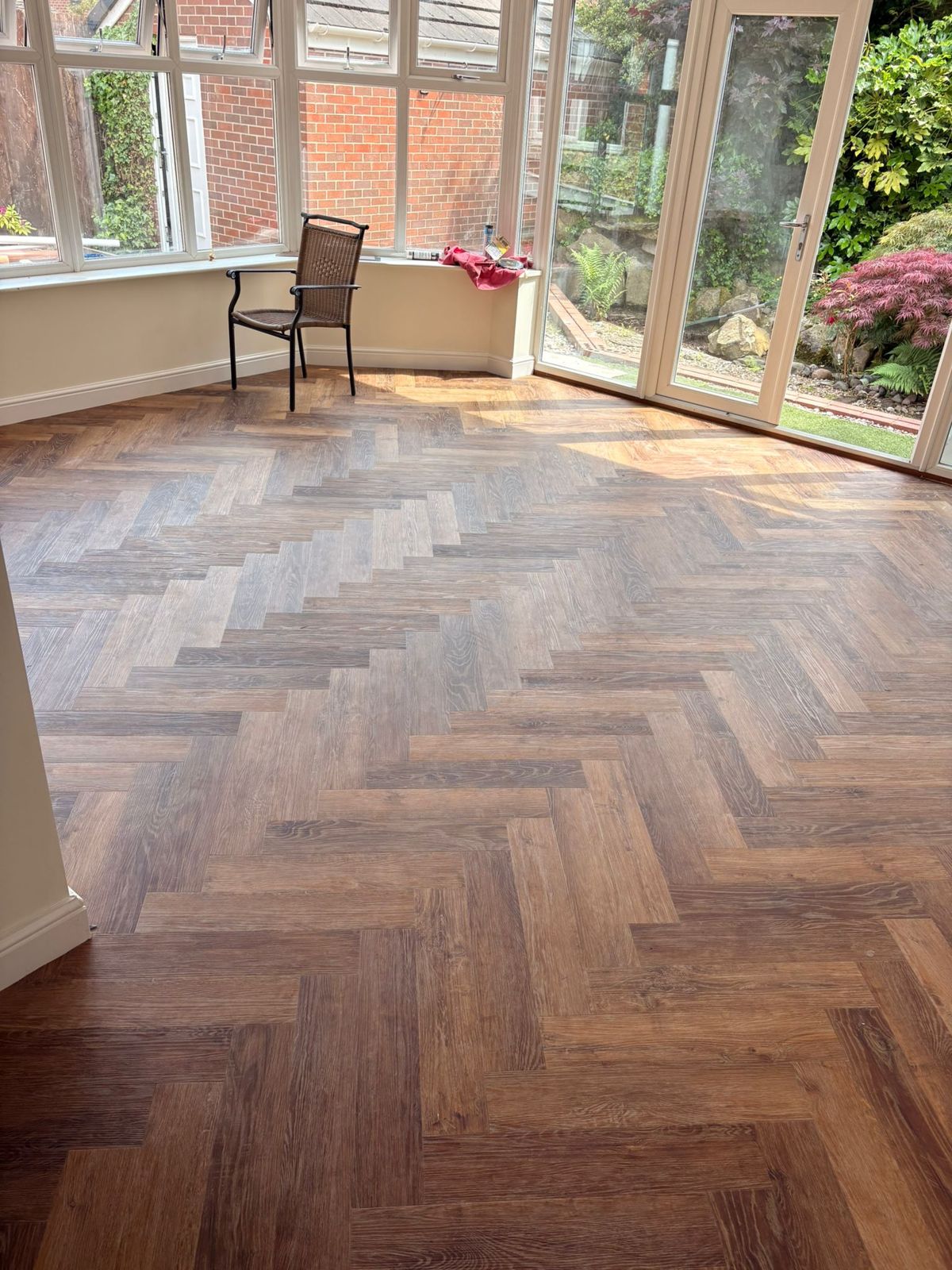 Finished herringbone LVT in a sunny Warrington conservatory