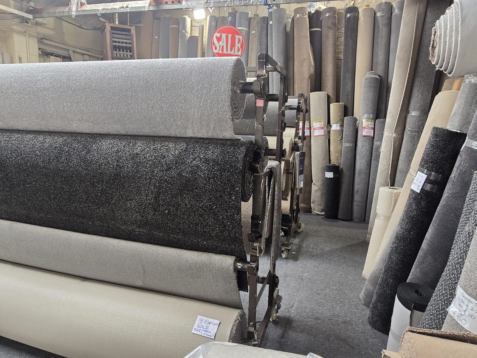 Carpet rolls stacked and priced in our Warrington showroom